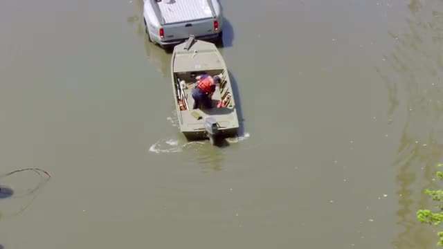 WS POV AERIAL ZI Rescue workers conducting rescue operation / United States