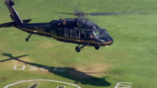 WS POV AERIAL TS ZI Helicopter landing on ground near waterfront / United States