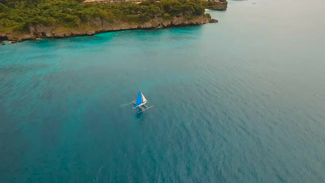 Sailing boat in blue sea. Boracay island Philippines.