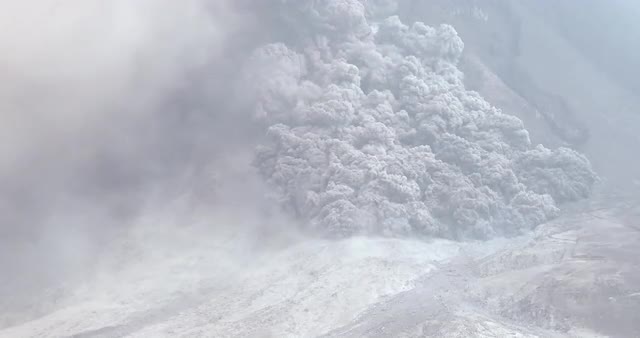 Large Pyroclastic Flow Tears Down Side Of Sinabung Volcano Large Pyroclastic Flow Tears Down Side Of Sinabung Volcano
