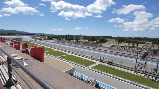Race Car on Track, Crosses Finish Line