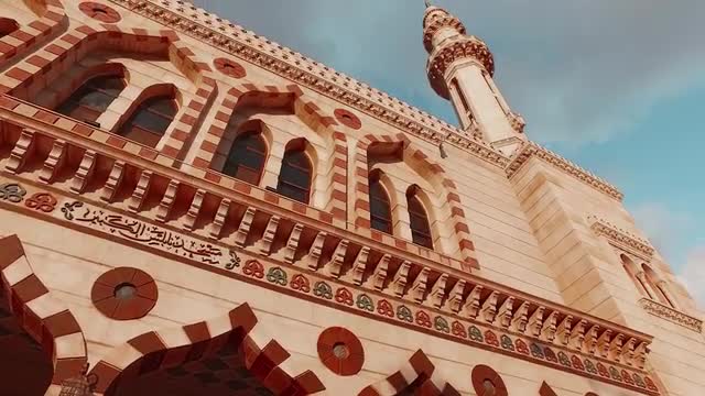 Architecture of a Modern Mosque and a High Minaret.