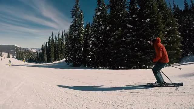 Male Skiing on an Easy Groomed Trail in Slow Motion