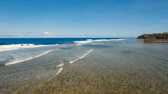 Water surface aerial view. Siargao, Philippines. Cloud 9.