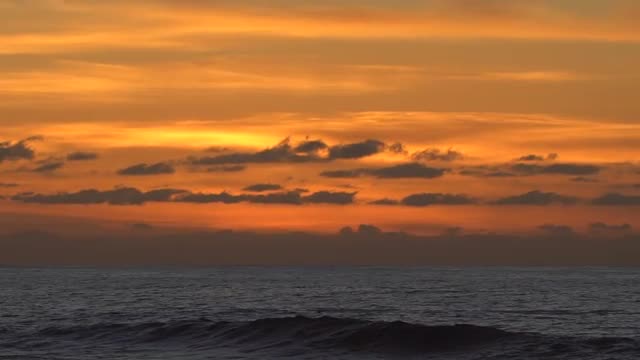 Wave Clashing Slow Mo Sunset