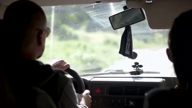Driving on a Rural Road, Rear Passenger's Pov, Foreground Focus