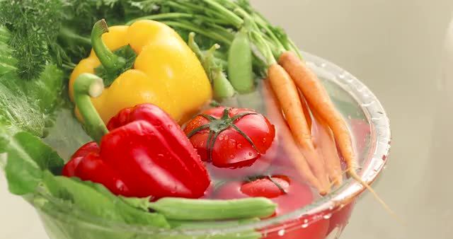 Close up of vegetables being washed