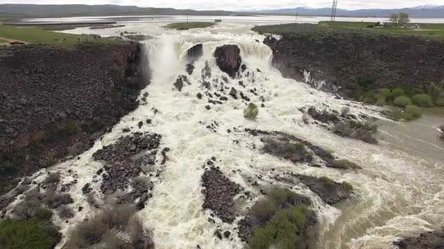 Aerial view of huge overflow waterfall at Magic Reservoir