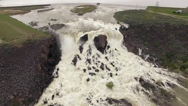 Aerial view of huge overflow waterfall at Magic Reservoir