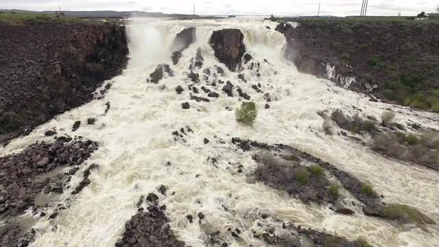 Aerial view of huge overflow waterfall at Magic Reservoir