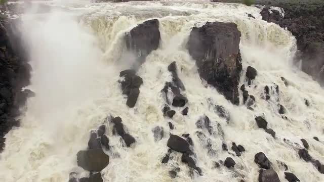 Aerial view of huge overflow waterfall at Magic Reservoir