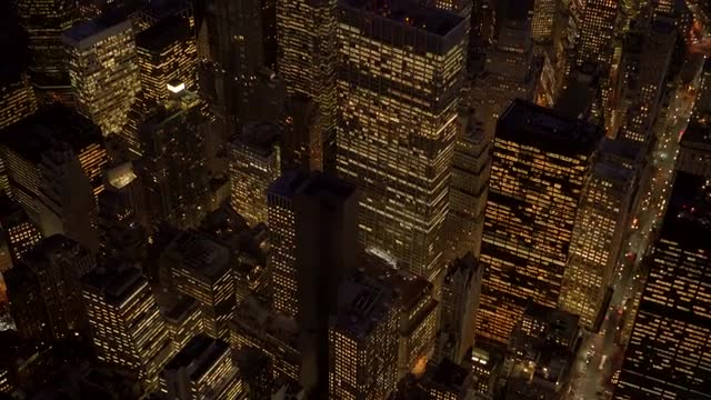 city business district. modern skyline cityscape. aerial view. shot on red epic