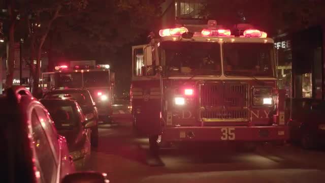 Fire department trucks getting emergency call. fireman rescue scene at night