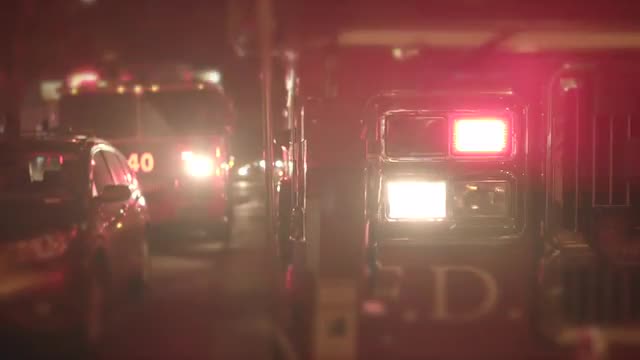 Fire trucks getting emergency call. fireman rescue scene at night