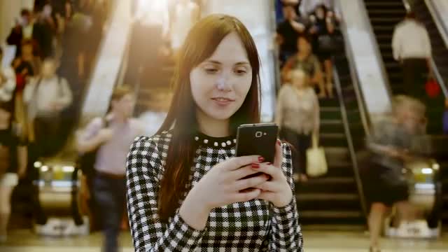 lifestyle portrait of beautiful  caucasian women in the city. people background