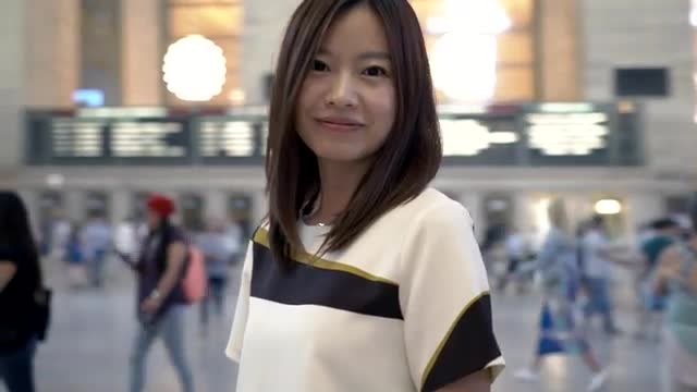 lifestyle portrait of young cute asian women looking at camera. city people view