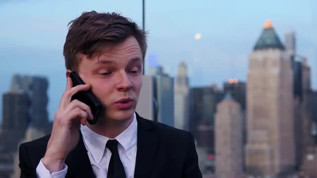 young caucasian business man talking on the phone. urban people lifestyle