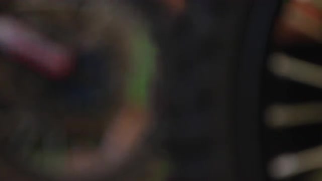 Mechanic Making Spoke Adjustments