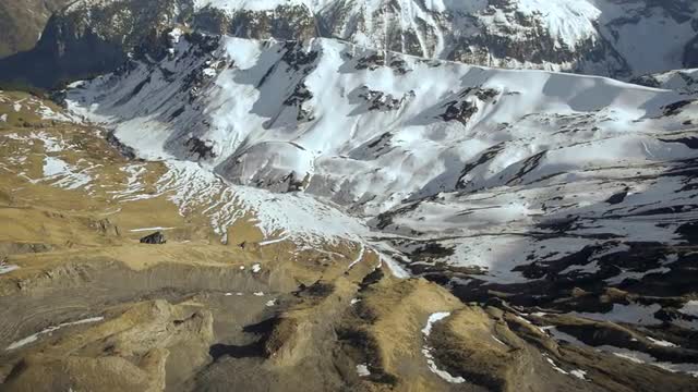 fly over snowcapped mountain panorama. winter landscape. alps glaciers