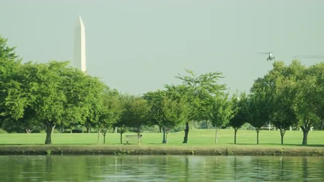 Helicopter Flying Towards Washington Monument
