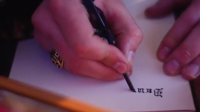 Man is Engaged in Calligraphy Sleeves of Ancient Clothing Embroidered With Golden Threads Romantic S