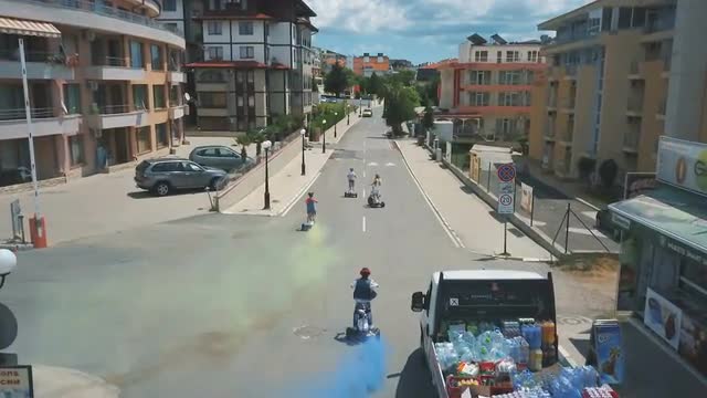 Children Riding On Electric Scooter