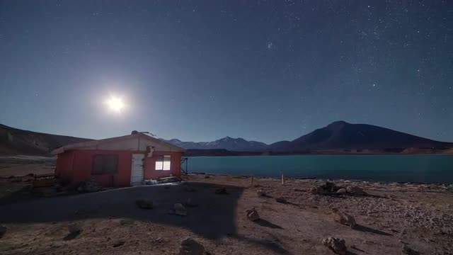 Laguna verde mountain hut and moonset