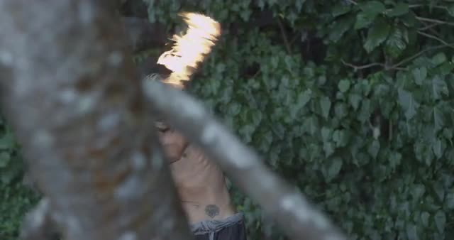 Man Playing with Fire