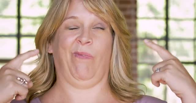 Woman expressing that she is crazy loony and out of her mind