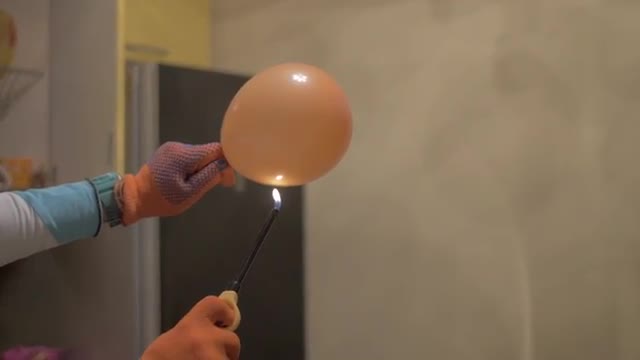Popping the balloon with fire explosion