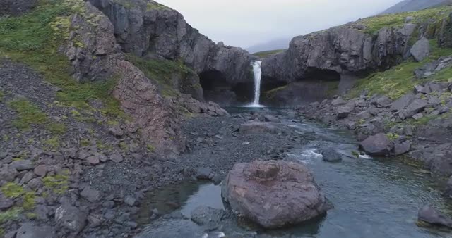 Flying up river towards the waterfall