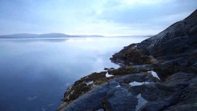Blue Light Over a Calm Lake