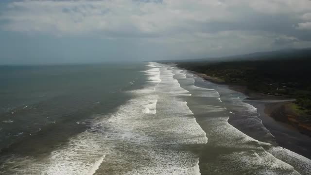 Beach, stormy weather, waves. Bali, Indonesia