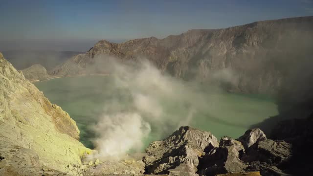 Kawah Ijen, Volcanic crater, where sulfur is mined.