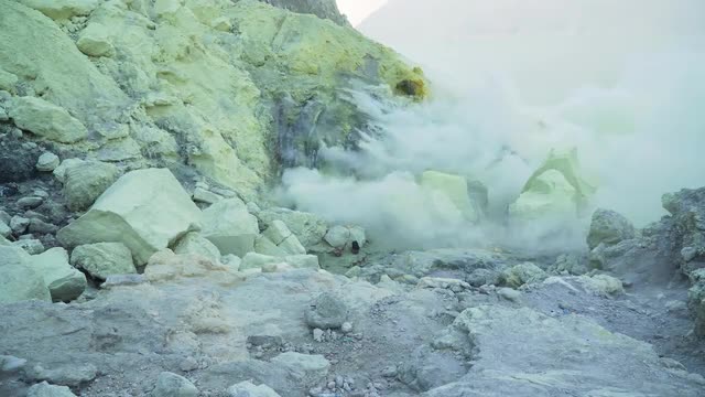 Kawah Ijen, Volcanic crater, where sulfur is mined.