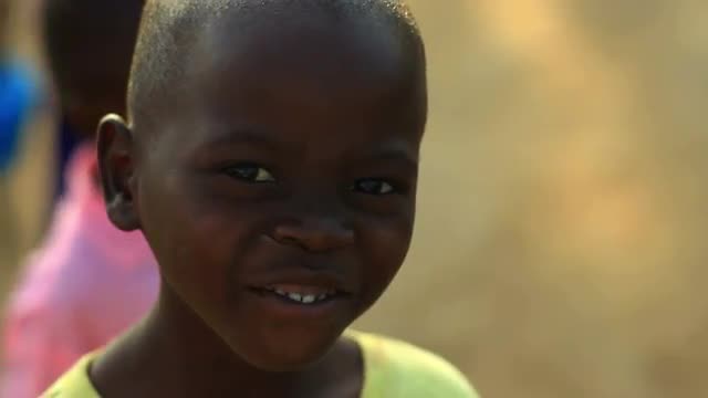 Kenyan boy staring at the camera.