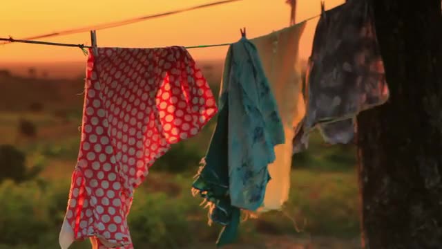 Kenyan hut with a clothesline.
