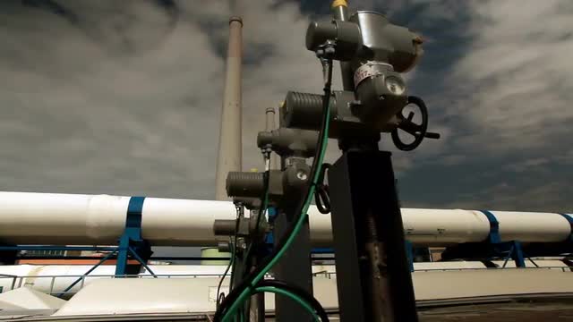 Stock Video Footage of valves, pipes, and smokestacks in Israel.