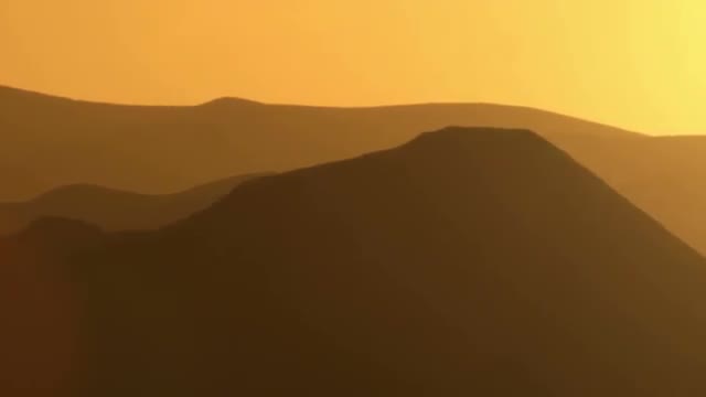 Panning shot of Silhouetted mountains at sunset shot in Israel.