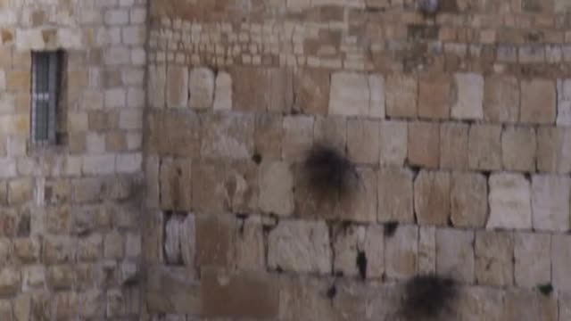 Panning shot of The Dome Of The Rock and Western Wall filmed in Israel.