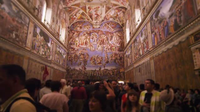 Tourists in the Sistine Chapel