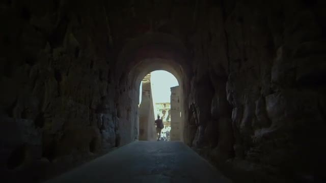 Walking shot through corridor in Roman Colosseum