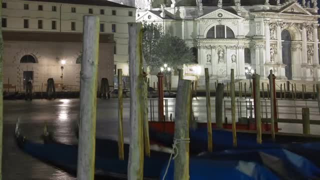 Time-lapse at night of Santa Maria della Salute from Saint Mark's Square. Cropped.