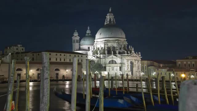 Time-lapse at night of Santa Maria della Salute from Saint Mark's Square.