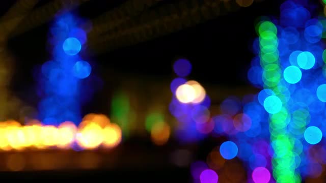 Christmas light bokeh with fire burning in background