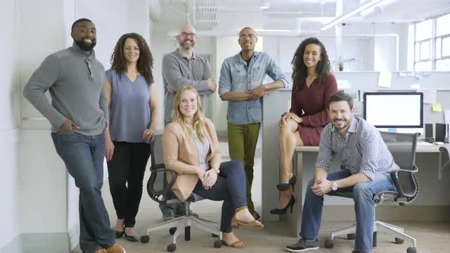 Portrait of confident business people in startup office