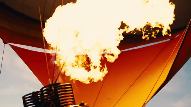 Hot air balloon. Fire bursts.