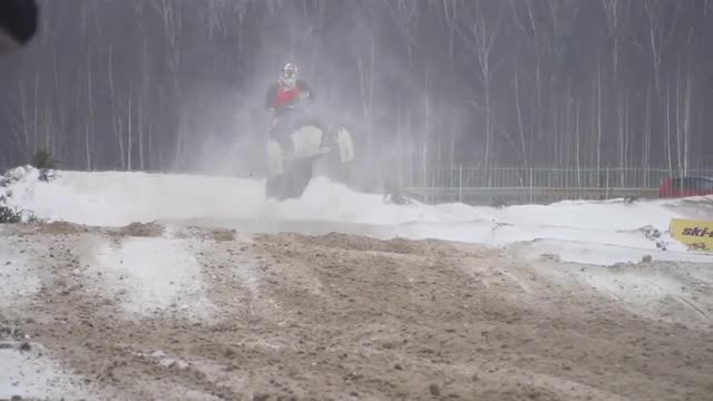 Snowmobile races in the winter season. Championship on snowmobiles January 27, 2018