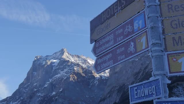 Grindelwald Village, Signpost and Schreckhorn, Bernese Oberland, Canton of Bern, Switzerland, Europe