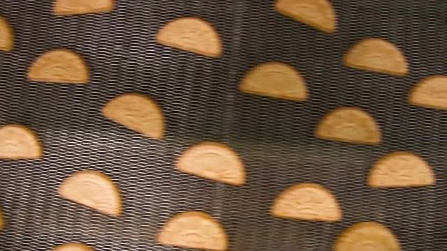 Conveyor with cookies.